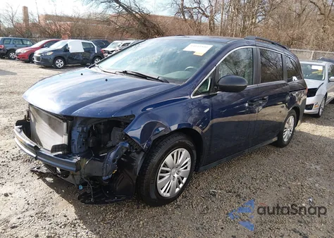 2015 Honda Odyssey Lx z USA, uszkodzony, nr VIN 5FNRL5H26FB124382